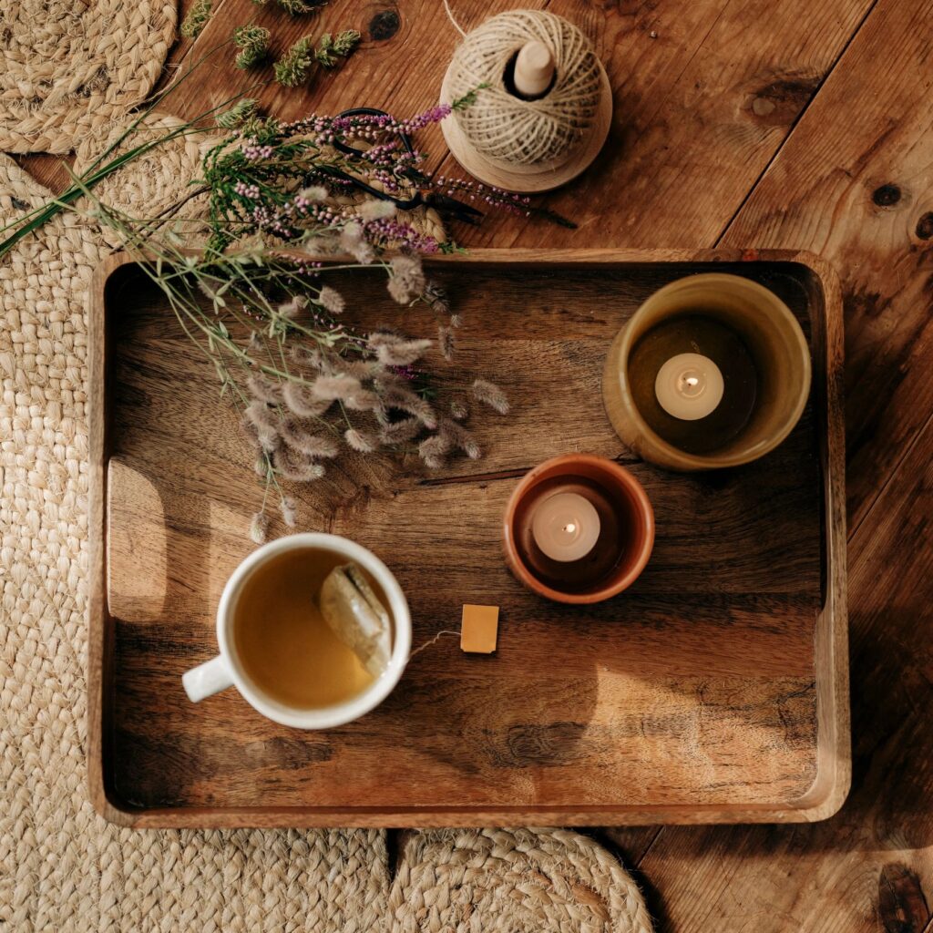 Autum tea cup still life with heather and hares foot clover